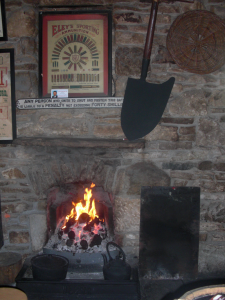 Enjoy a seat by the fire at Mellett's Emporium Swinford Co Mayo